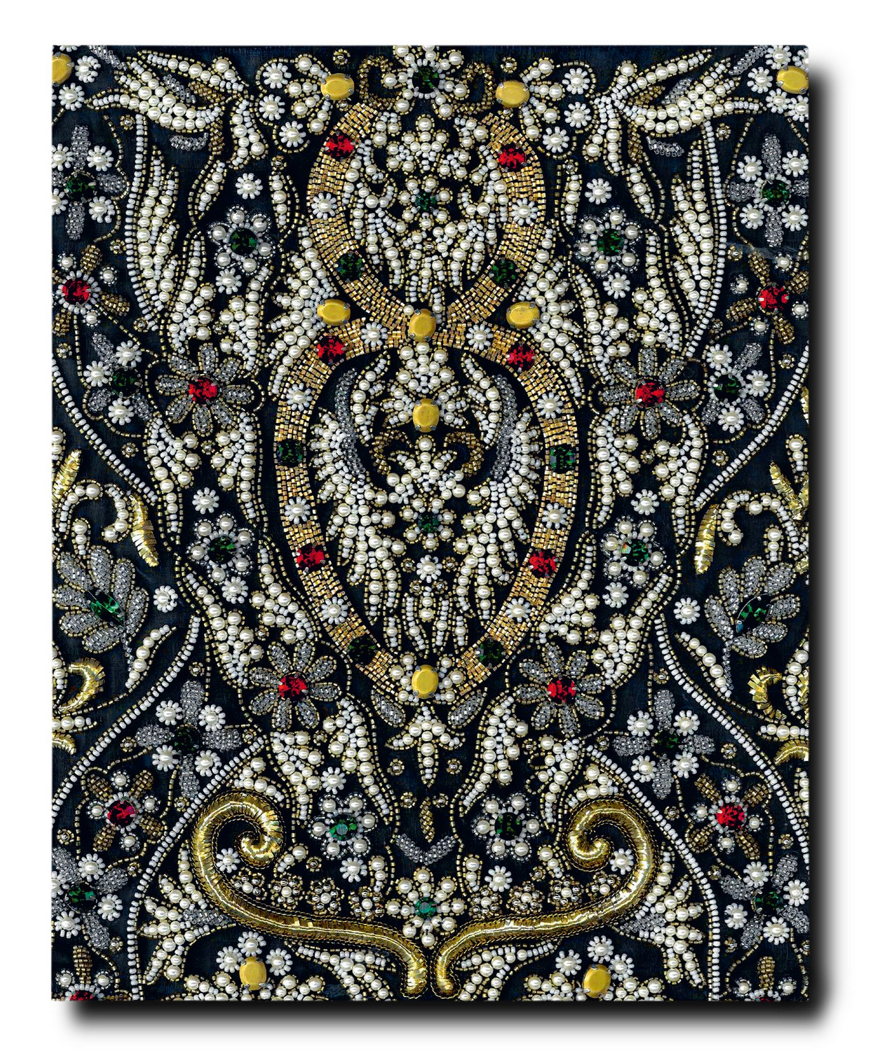 Intricate embroidery with gold threads, red and green beads, and floral patterns on dark fabric evokes the style of Zuhair Murad as celebrated by Assouline.