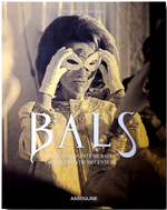 Nicholas Foulkes' "Legendary Costume Balls of the Twentieth Century" from Assouline features a woman in an ornate mask, capturing Art Deco Paris vibes, on its cover.