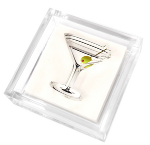 The Tara Wilson Designs Lucite Cocktail Napkin Holder with Martini Weight features a silver martini glass pin with an olive detail, displayed on a white background inside a clear acrylic holder.