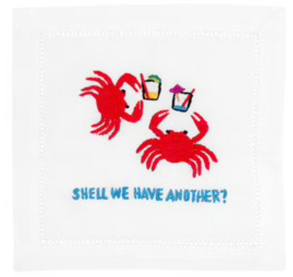 An elegant August Morgan linen napkin with a classic hemstitched border, adorned with charming crabs and the humorously playful phrase 'shall we have another?'
