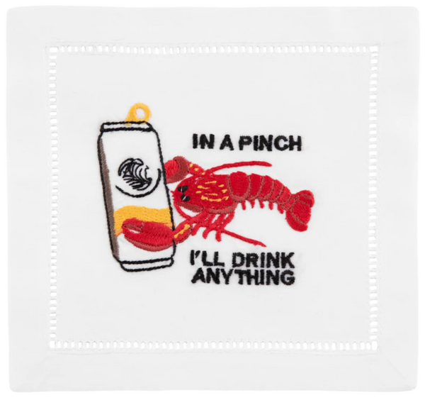 Square patch featuring an August Morgan Cocktail Napkins Lobster holding a drink can next to the text "in a pinch i'll drink anything," enhanced with classic hemstitching.