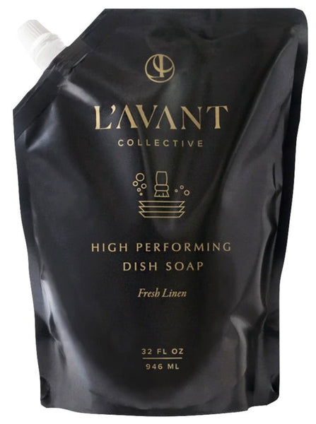 Black flexible pouch of L'Avant Collective high performing dish soap refill labeled "fresh linen," 32 fl oz.