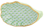 The Herend Oyster Shell is a ceramic dish shaped like a shell, hand painted in green and turquoise scale patterns, and finished with an elegant gold rim.