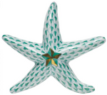 The Herend Miniature Starfish is a hand-painted porcelain figurine featuring green scale-like patterns and a gold accent at its center.