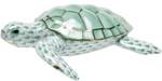 The Herend Loggerhead Turtle is a porcelain figurine featuring a green and white scale pattern with hand-painted details and gold accents on the shell, mouth, and eyes.