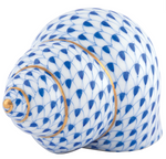 The Periwinkle Shell by Herend features a blue fish scale pattern with gold accents on white porcelain, highlighting Herend's exquisite hand-painted artistry.
