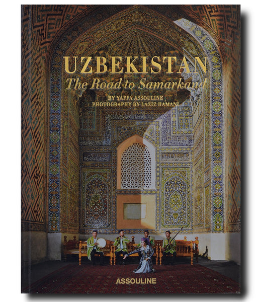 Front cover of a book titled "Uzbekistan: The Road to Samarkand" by Assouline with photography by Laziz Hamani, featuring a group of musicians in traditional costumes.
