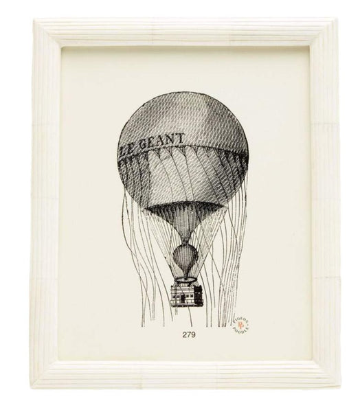 Framed illustration of a vintage hot air balloon labeled "le geant," detailed with hand-etched ribbing, displayed in a Pigeon & Poodle Velden Picture Frame, 8 x 10.