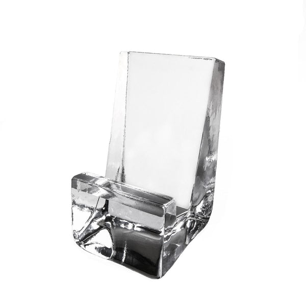 A Simon Pearce Woodbury Glass Phone Holder with a white background, perfect for conference calls.