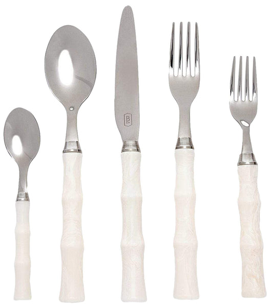 A set of Blue Pheasant Montecito Ivory 5 Piece Flatware Set cutlery and forks on a white background.