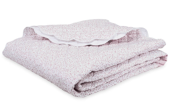 Folded Matouk Celine Bedding Collection pink and white patterned Egyptian cotton percale bedspread on a white background.
