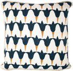 The Tulip Midnight & Copper Pillow by Hive Custom Pillows is a 22" square cushion with a geometric pattern of black and brown shapes. Handmade in the USA, it features braided trim and custom down filling for ultimate comfort.