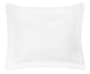 The Matouk Diamond Pique Bedding Collection in white features a pillow with scalloped edges and a diamond-patterned pique, shown against a white background.