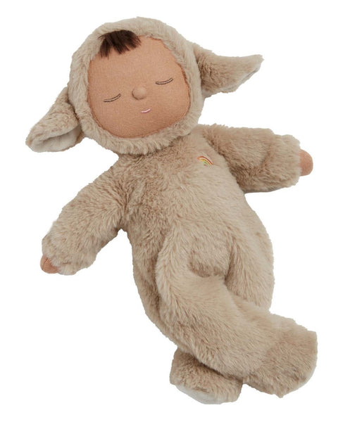 A cozy stuffed animal, dressed in a garment, resembling a beige lamb named pip by Olli Ella.
