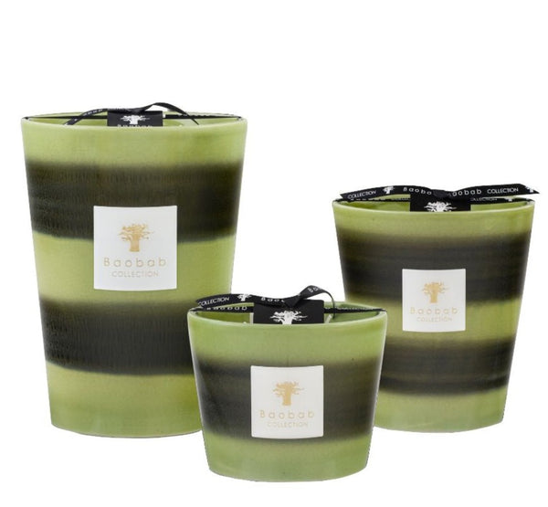 Three Baobab Elementos Gaia Candle Collection candles of varying sizes with black embellishments, including a peppermint geranium scented candle.