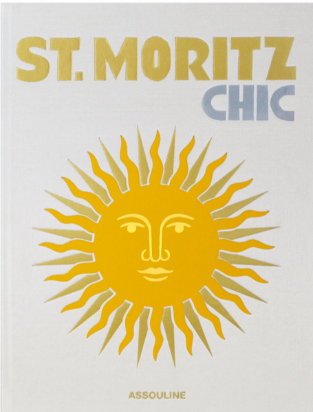 Replace with product name and brand name: Assouline's "St. Moritz Chic" book cover, highlighting luxury travel with a graphic of a sun with a face, featuring content on the Snow Polo World Cup.
