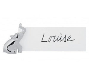 The Ercuis Elephant Placecard Holder Set includes six silver holders, each elegantly displaying a name card—like this one for "Louise"—to add a refined touch to your table setting.