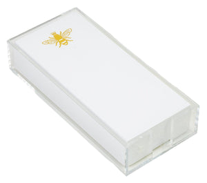 The Bumble Bee Skinny Notepad by Black Ink features a white rectangular box with a clear lid and a gold foil bee illustration, crafted from sturdy cardstock.