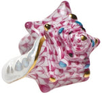 The Herend Small Conch Shell ring features a pink and white seashell design with blue spots and gold accents, highlighting hand-painted artistry on a smooth band for an elegant, artistic look.