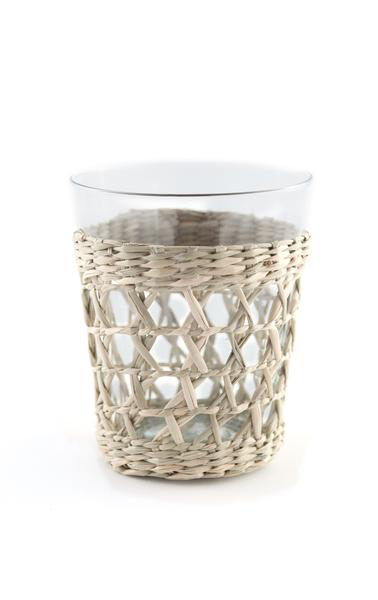 A Seagrass Wrapped Cage Wide Tumbler from Kiss That Frog with a glass pitcher inside.