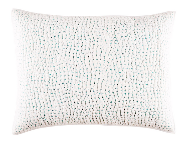 A John Robshaw Hand Stitched Sham, Seaglass coverlet with super fine turquoise dots on a white pillow.