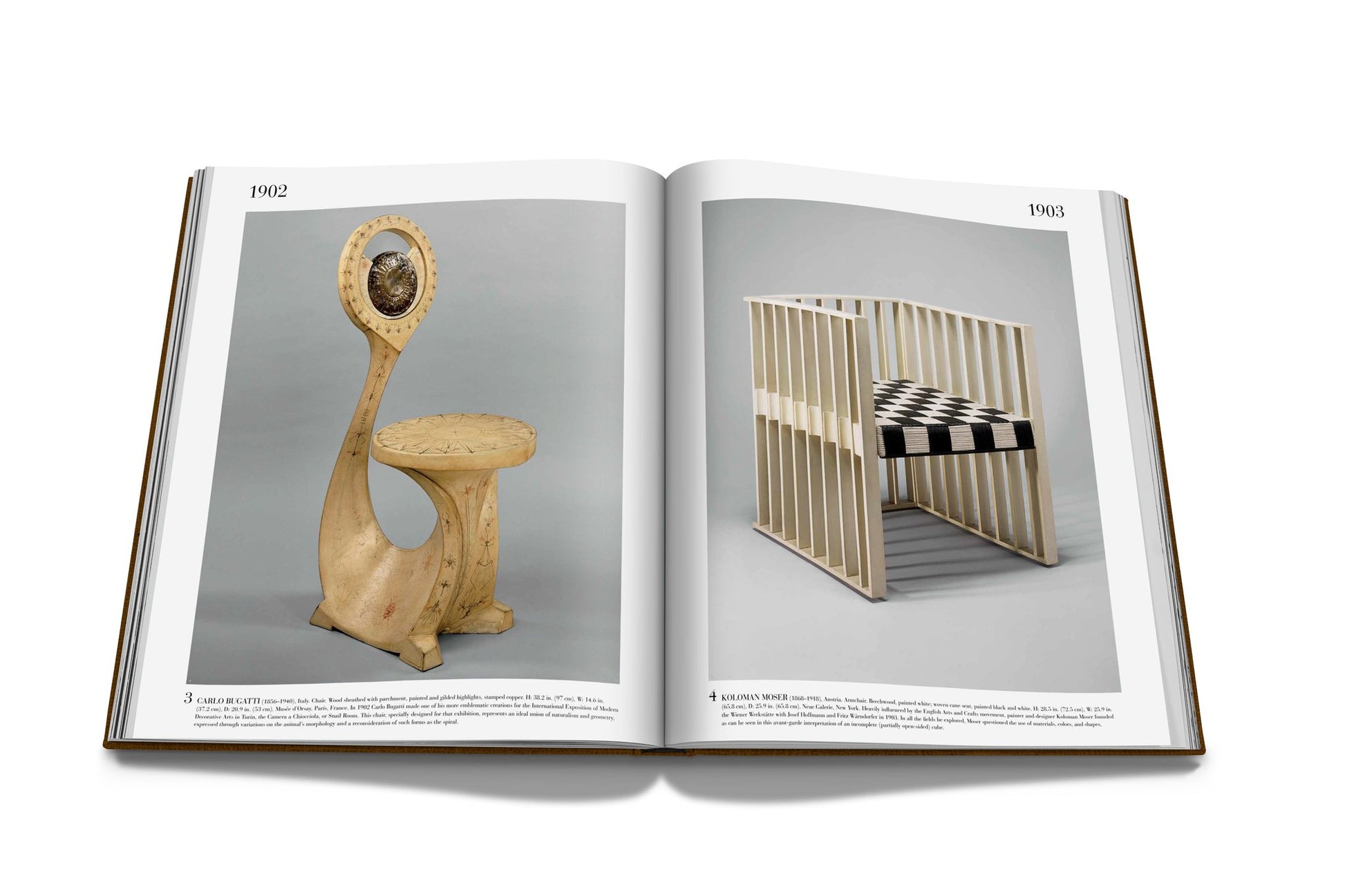 The open book "The Impossible Collection of Design" by Assouline features images of two iconic early twentieth-century chairs: one with a circular backrest labeled 1902 and another modern chair with a checkerboard seat cushion labeled 1903.