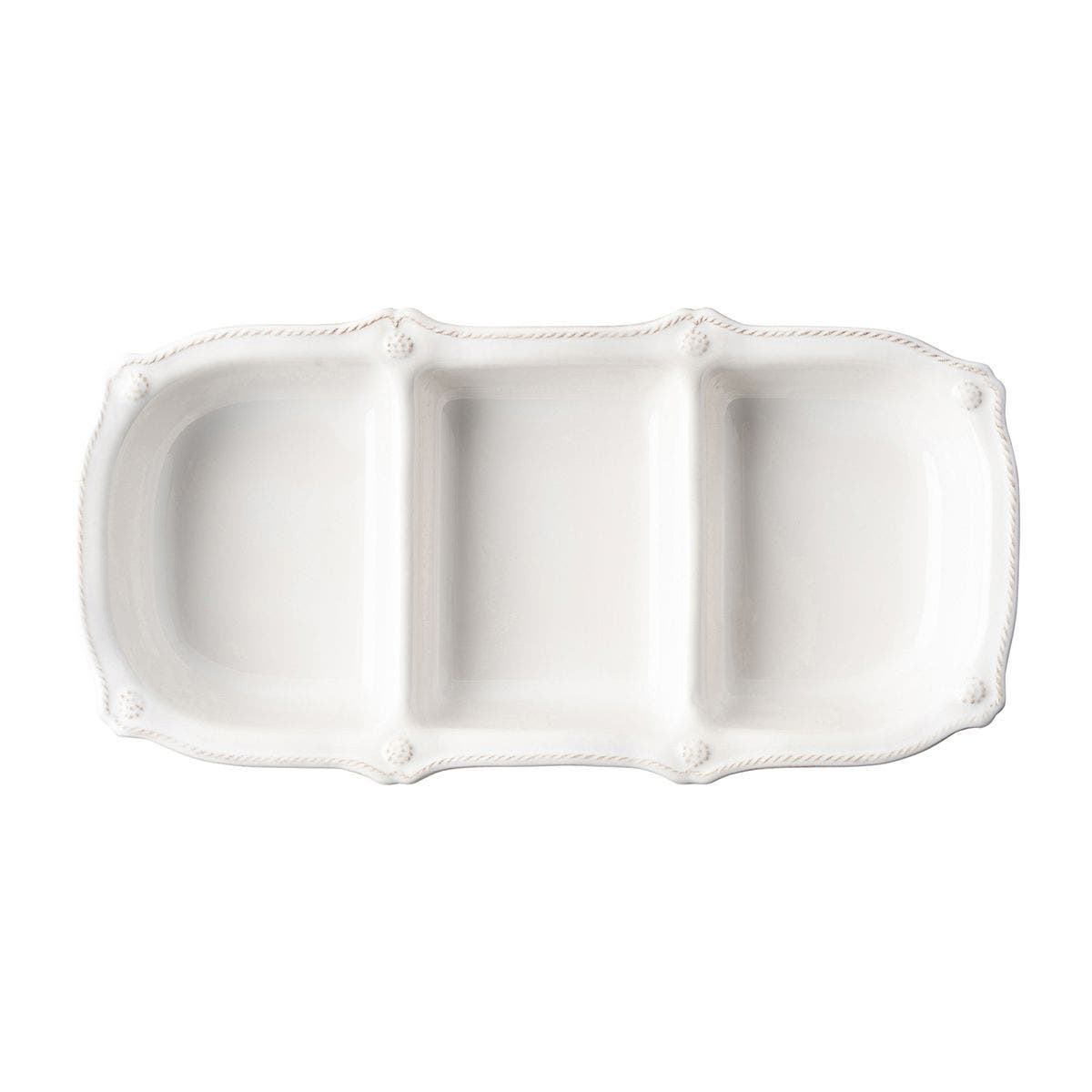 The Juliska Berry & Thread Whitewash Triple Section Server is a rectangular ceramic tray with three compartments and a decorative edge, perfect for stylish serving.