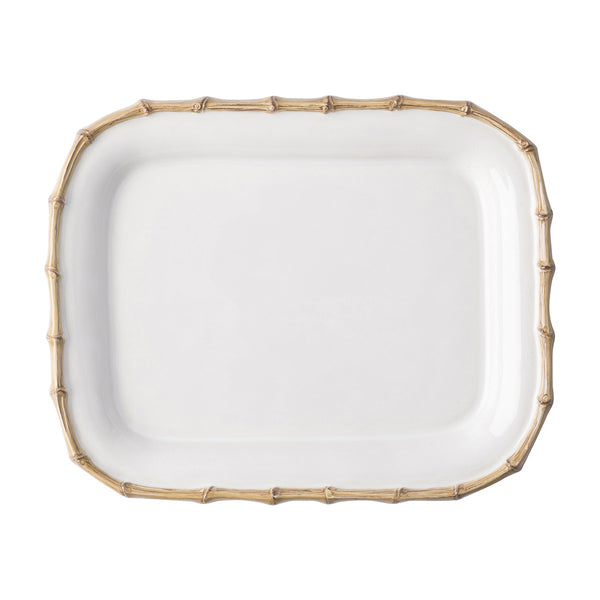 A Juliska Classic Bamboo Small Rectangular Platter with a bamboo rim, also known as a platter.