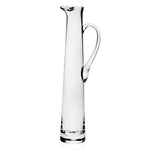 The Lillian Tall Cocktail Jug by William Yeoward Crystal features clear handmade glass, a narrow body, flared spout, and curved handle—ideal as a wine decanter or for serving cocktails. Shown against a white background.