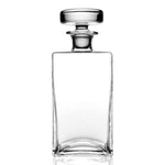 The William Yeoward Crystal Lillian Square Decanter features clear handmade glass with a square body and round stopper, perfect for elegant spirits storage, shown against a white background.