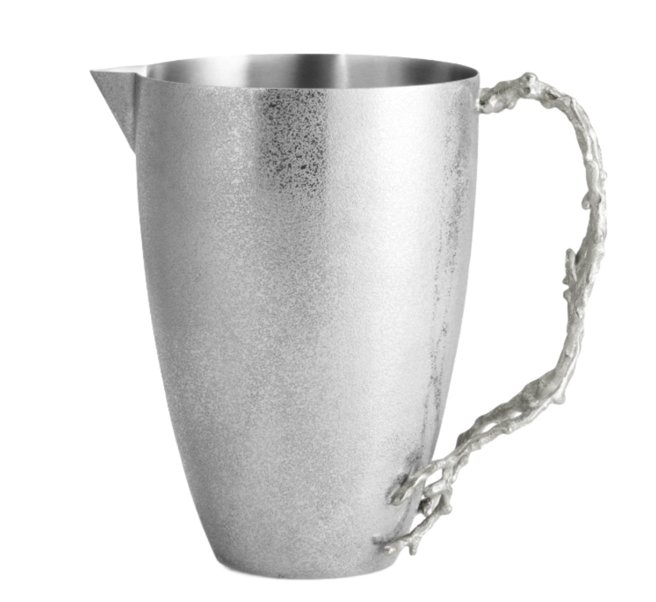 The Michael Aram Ocean Reef Pitcher features a matte, hand-textured stainless steel finish and a handle inspired by coral reef branches.