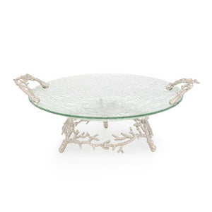 An Ocean Reef Seafood Platter-inspired glass serving tray with a metal handle by Michael Aram.