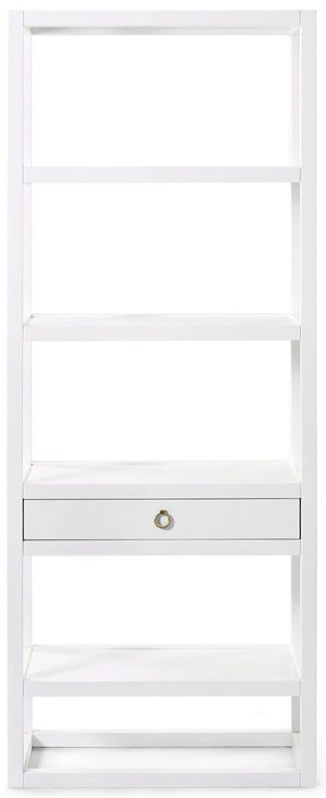 Explore the Newport Etagere by Bungalow5 in white lacquer, a freestanding bookshelf with five open shelves and a central drawer. Its sleek, modern design is inspired by campaign furniture, combining style and function.