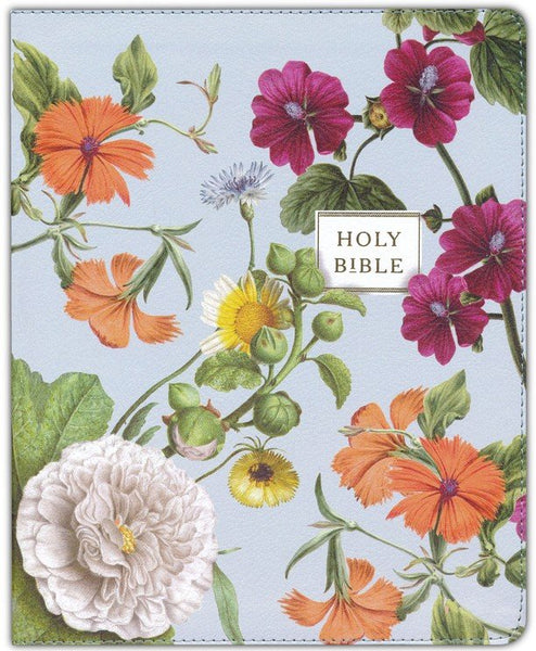 This NIV Artisan Collection Bible Leathersoft, Blue Floral features a floral design with the words "Holy Bible" by Thomas Nelson.