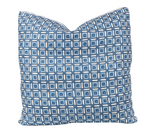 The Blue San Michele Pillow by Hive Custom Pillows is handmade with a blue and white geometric pattern of interlocking rectangles and squares.