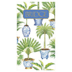 The Caspari Potted Palms Bridge Score Pad features an illustrated cover with blue and white vases and palm plants, plus a gold "BRIDGE" title—ideal for card games or as a stylish hostess gift.