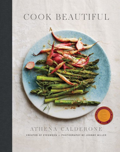 Cookbook cover featuring a plate of asparagus and radishes with the title "Cook Beautiful" by Athena Calderone of Common Ground.