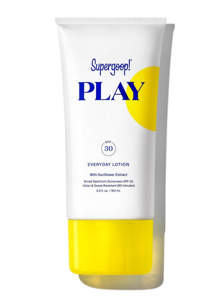 A white bottle with a yellow lid containing Supergoop! Play Everyday Lotion with Sunflower Extract SPF 30, 5.5 oz for broad-spectrum protection.