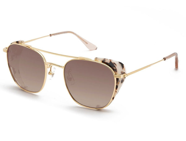 A pair of Krewe Earhart Blinker Sunglasses with brown lenses.