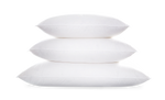 Three Matouk Valletto Goose Down Pillows in Queen size are stacked atop each other against a plain backdrop.