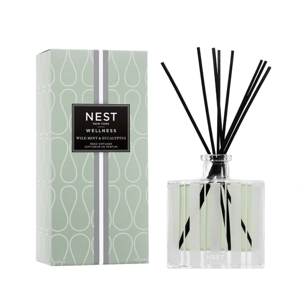 A Nest Wild Mint & Eucalyptus Reed Diffuser alongside its packaging.