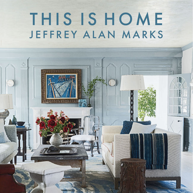 cover of this is home by jeffrey alan marks, featuring a living room with light blue, white, and navy accents