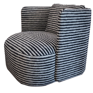 A black and white patterned Hudson Swivel Club Chair with geometric designs, featuring a square backrest and rounded seat. Part of the Pure by Hive collection from Verellen, this piece exudes modern elegance suitable for any sophisticated space.