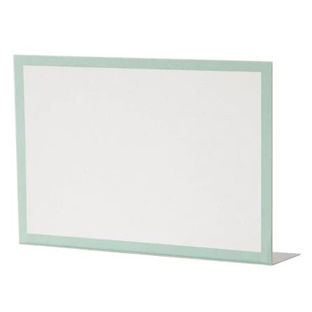 The Hester & Cook Frame Place Cards are blank rectangular cards with a pale green border, ideal as place cards or buffet labels, and are shown standing upright on a white background.