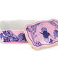 The Oriente Italiano Azalea Serveware & Decor Collection by Ginori 1735 features a rectangular porcelain box with a matching lid, pink background, blue floral patterns, gold trim, and white interior—an elegant addition to any home decor.