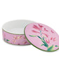 Round ceramic box from the Florenza Impero Malva Dinnerware and Decor Collection by Ginori 1735, featuring a pink floral design and a matching lid, partially open to reveal its white interior—an elegant piece inspired by Tuscany tableware and classic Italian porcelain craftsmanship.