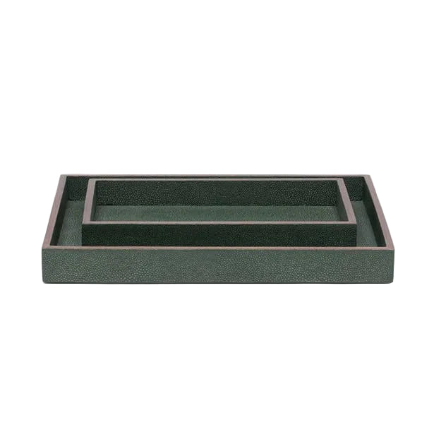 Two rectangular green trays from the Manchester Bath Collection by Pigeon & Poodle, one nested inside the other, are displayed on a white background. Elegant veneer trim enhances their minimalist, sophisticated design.