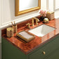 The Norwell Bath Collection by Pigeon & Poodle showcases a bathroom vanity with a red marble countertop, gold faucet and accessories, rectangular sink, folded towel, décor pieces, and a framed mirror.