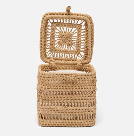 Pigeon & Poodle Reed Single Toilet Paper Holder, a square woven natural rattan holder with an open lid for sophisticated bathroom decor.