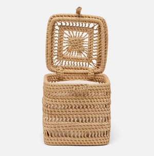 Pigeon & Poodle Reed Single Toilet Paper Holder, a square woven natural rattan holder with an open lid for sophisticated bathroom decor.